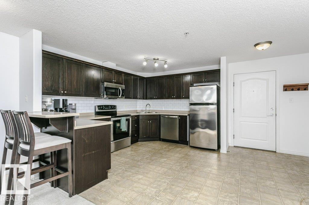 #6305 7331 SOUTH TERWILLEGAR DR NW - 3