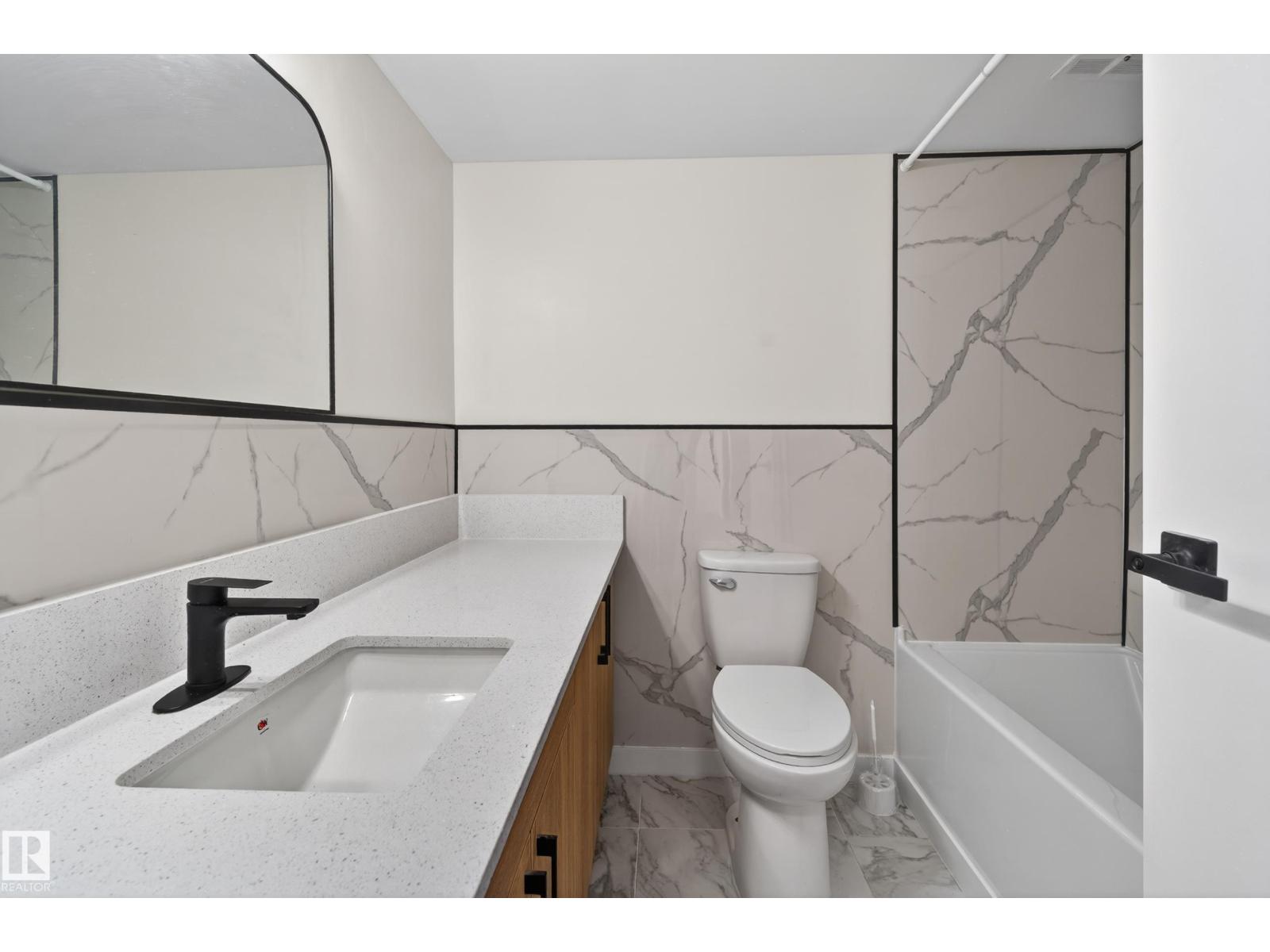#90 8745 165 ST NW - 6