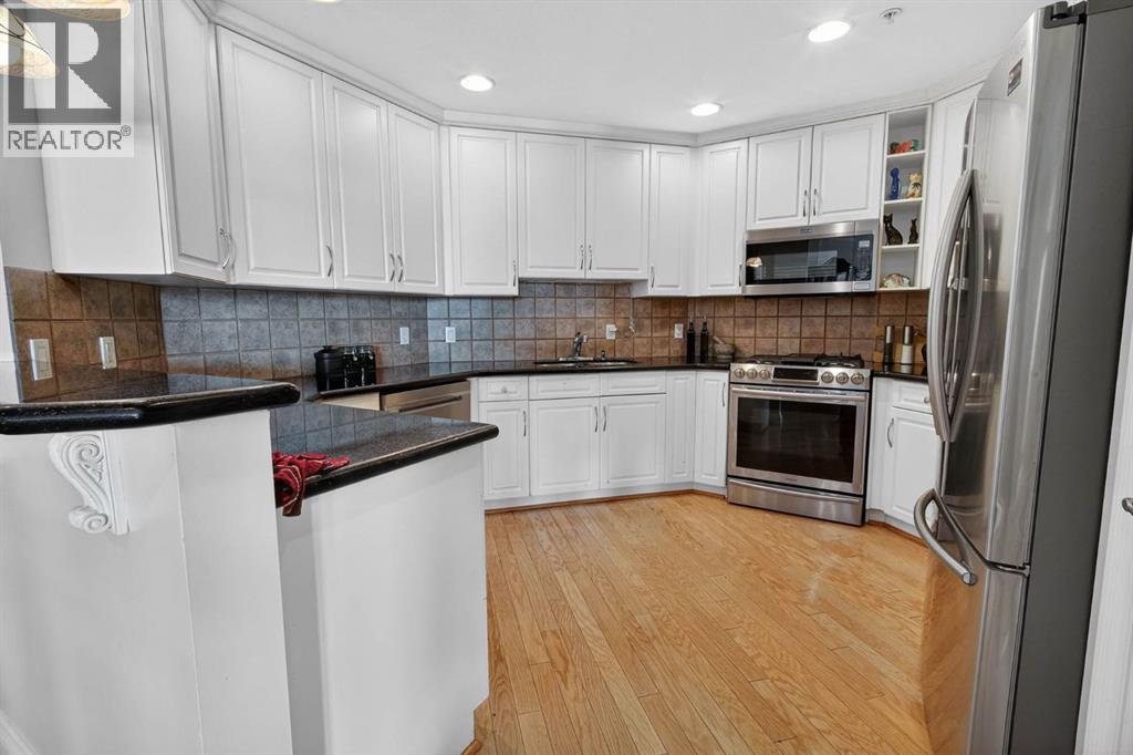 #110 1718 14 Avenue NW - 17