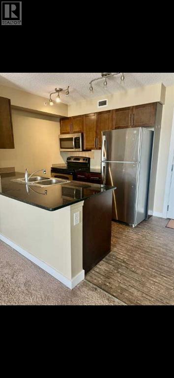 #420 7110 80 Avenue NE - 4