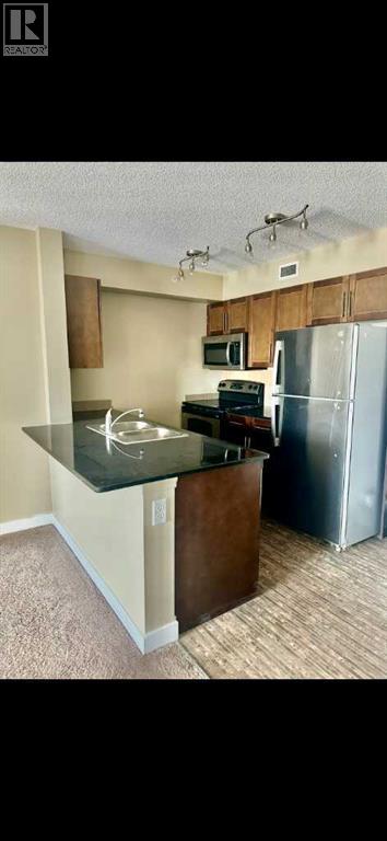 #420 7110 80 Avenue NE - 9