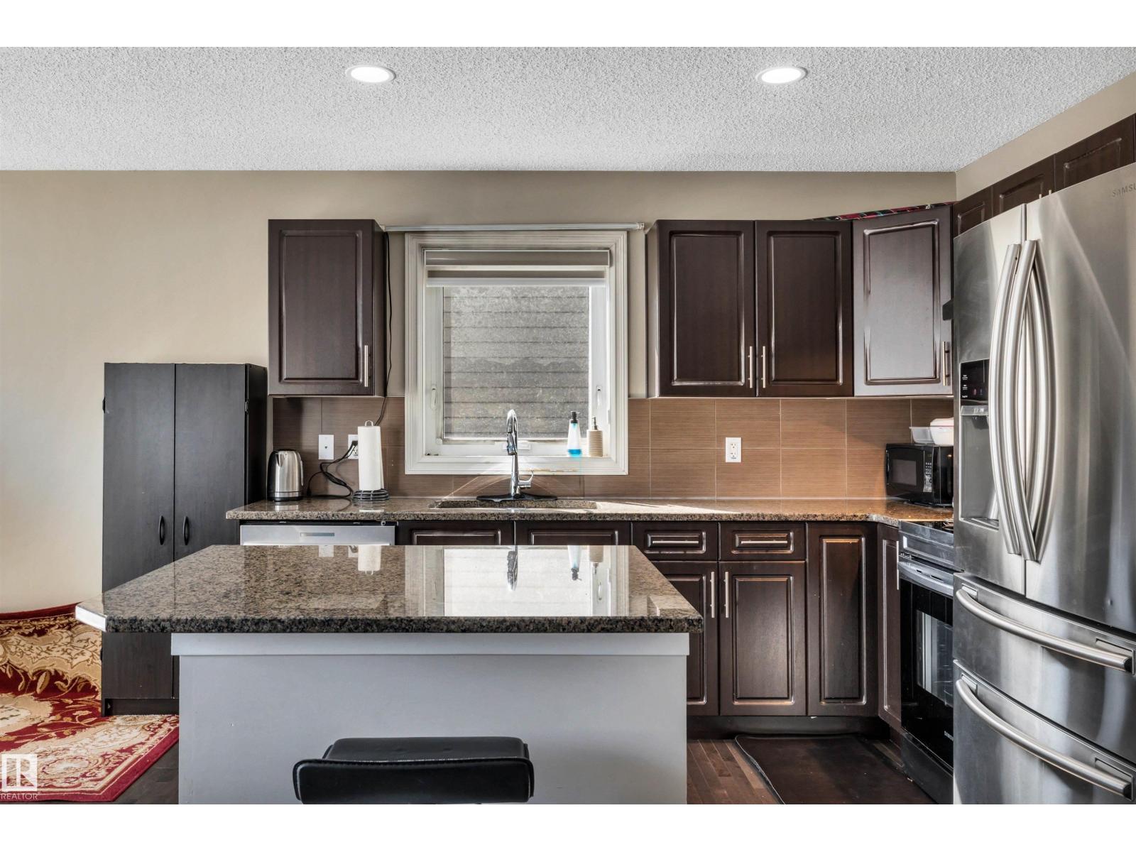 #30 655 TAMARACK RD NW - 10