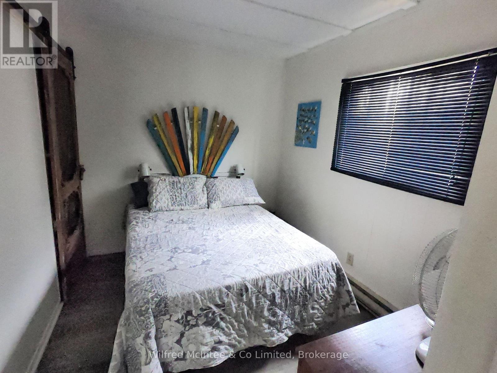210 THOMPSON AVENUE - 11