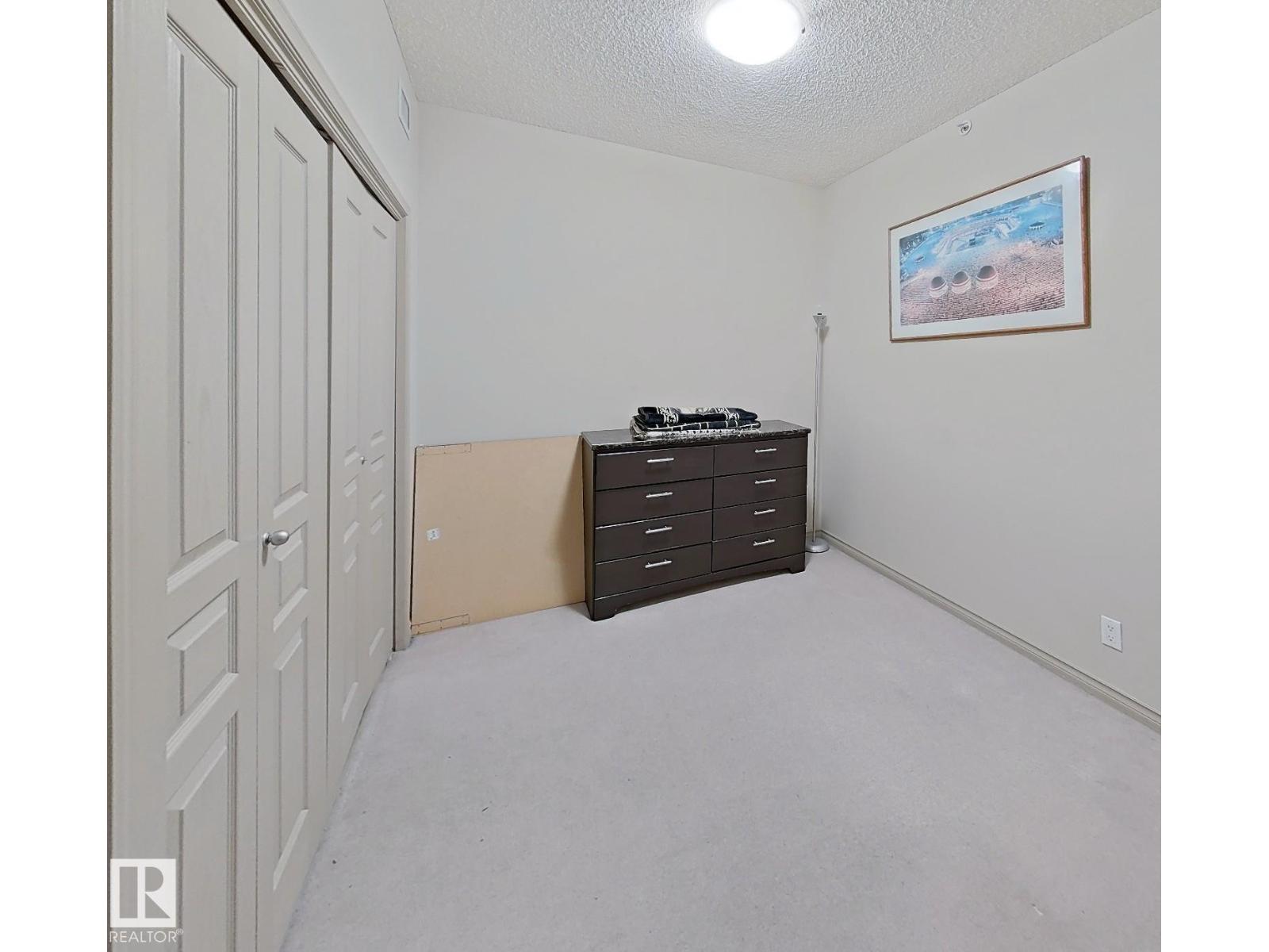 #707 10319 111 ST NW NW - 18