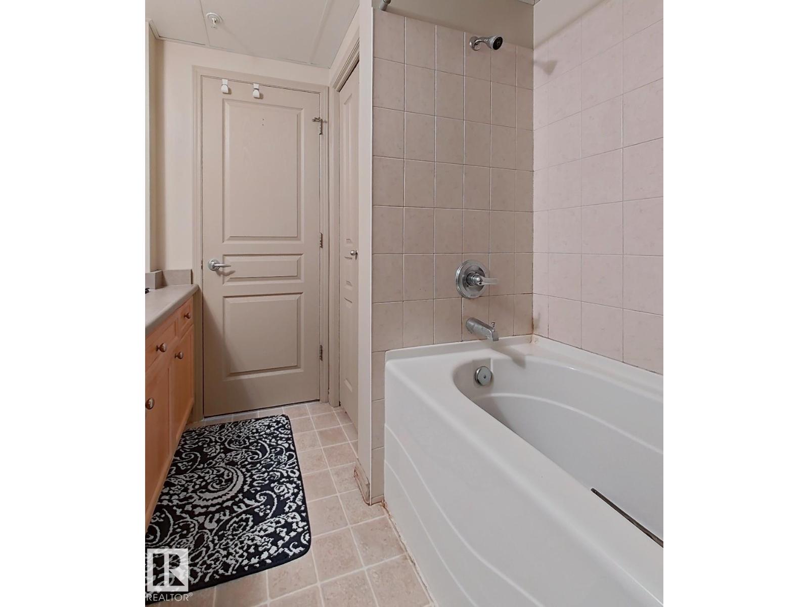 #707 10319 111 ST NW NW - 24