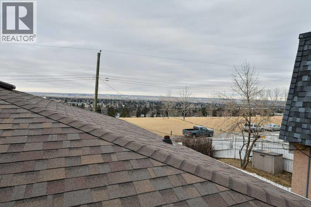 #5 7740 Hunterview Drive NW - 13