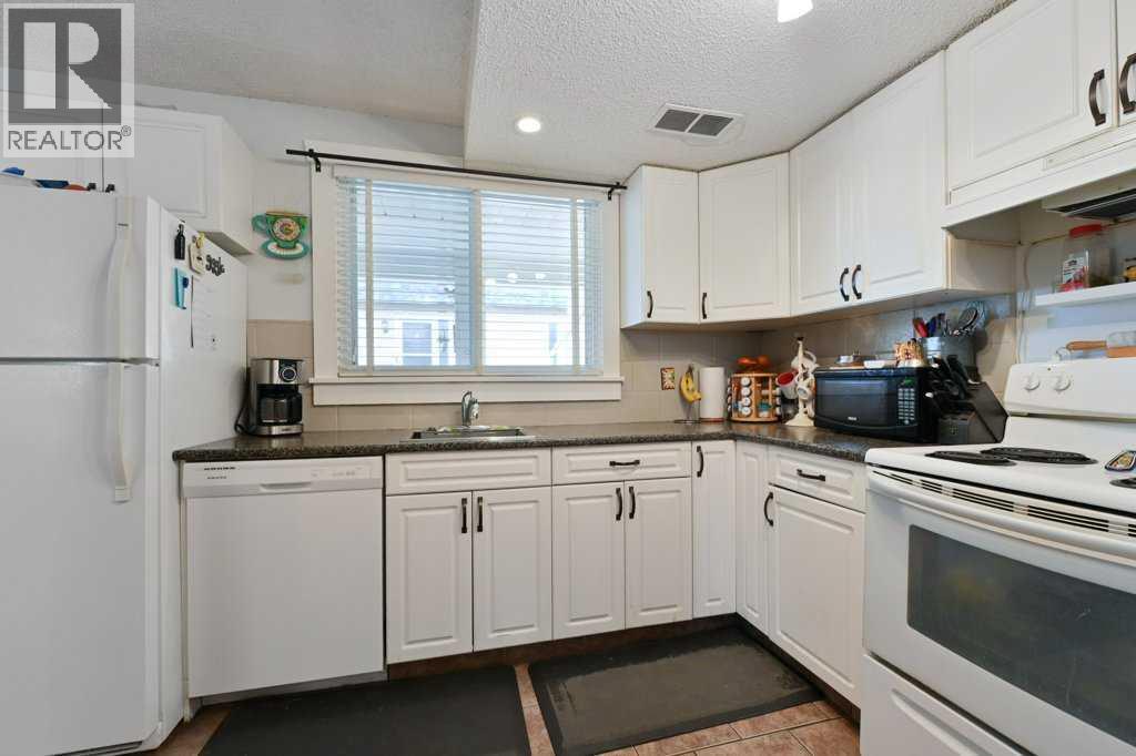 #5 7740 Hunterview Drive NW - 5