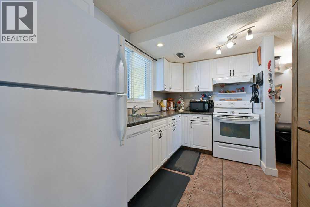 #5 7740 Hunterview Drive NW - 6