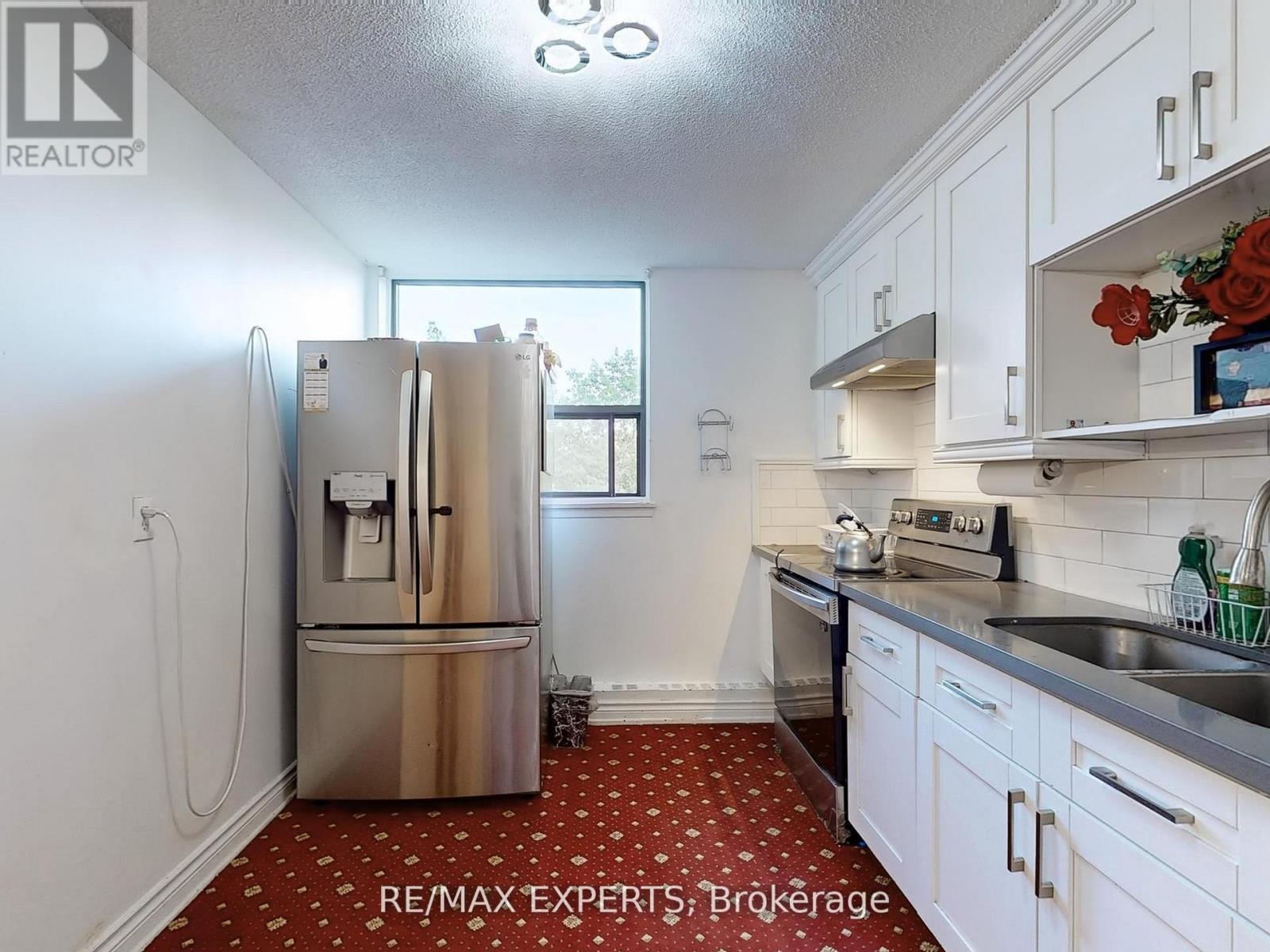 #410 100 WINGARDEN COURT - 22