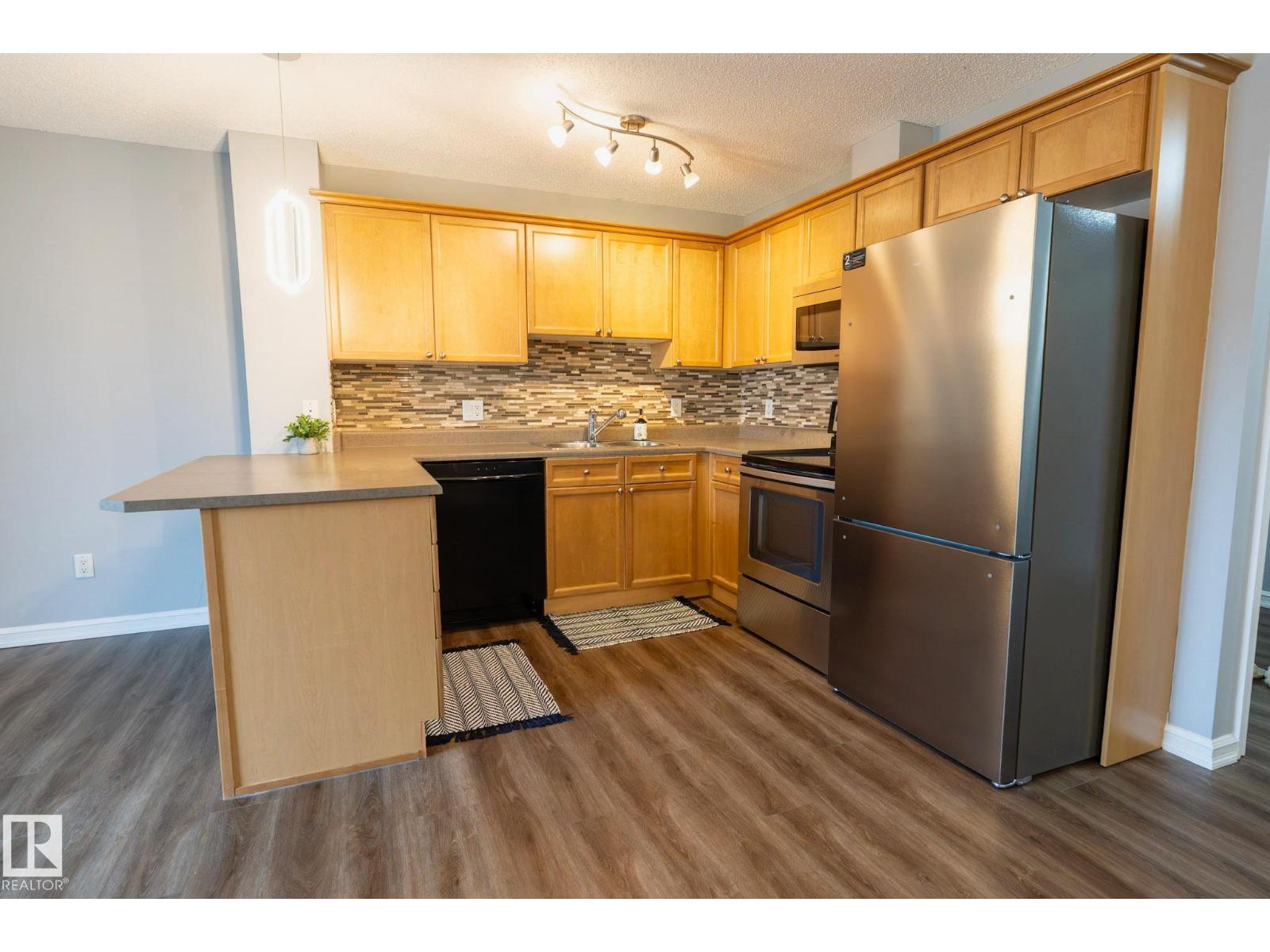 #404 4407 23 ST NW - 3