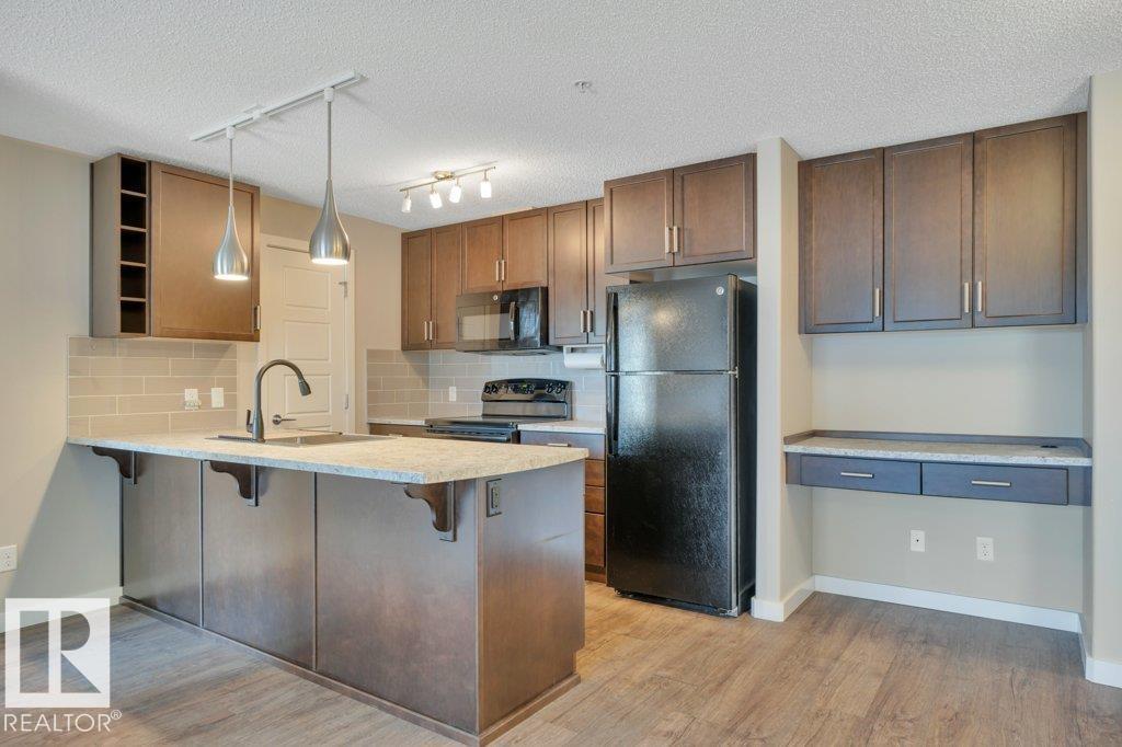 #206 5510 SCHONSEE DR NW - 16