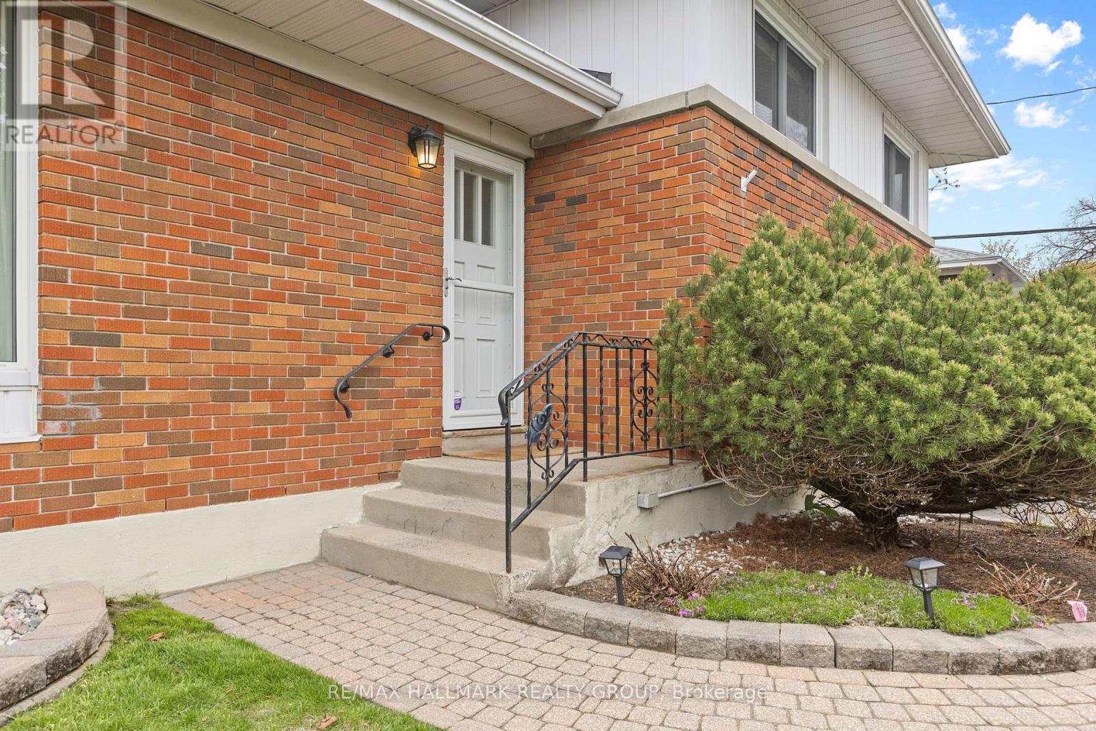 Interlock walkway with landscaped front yard