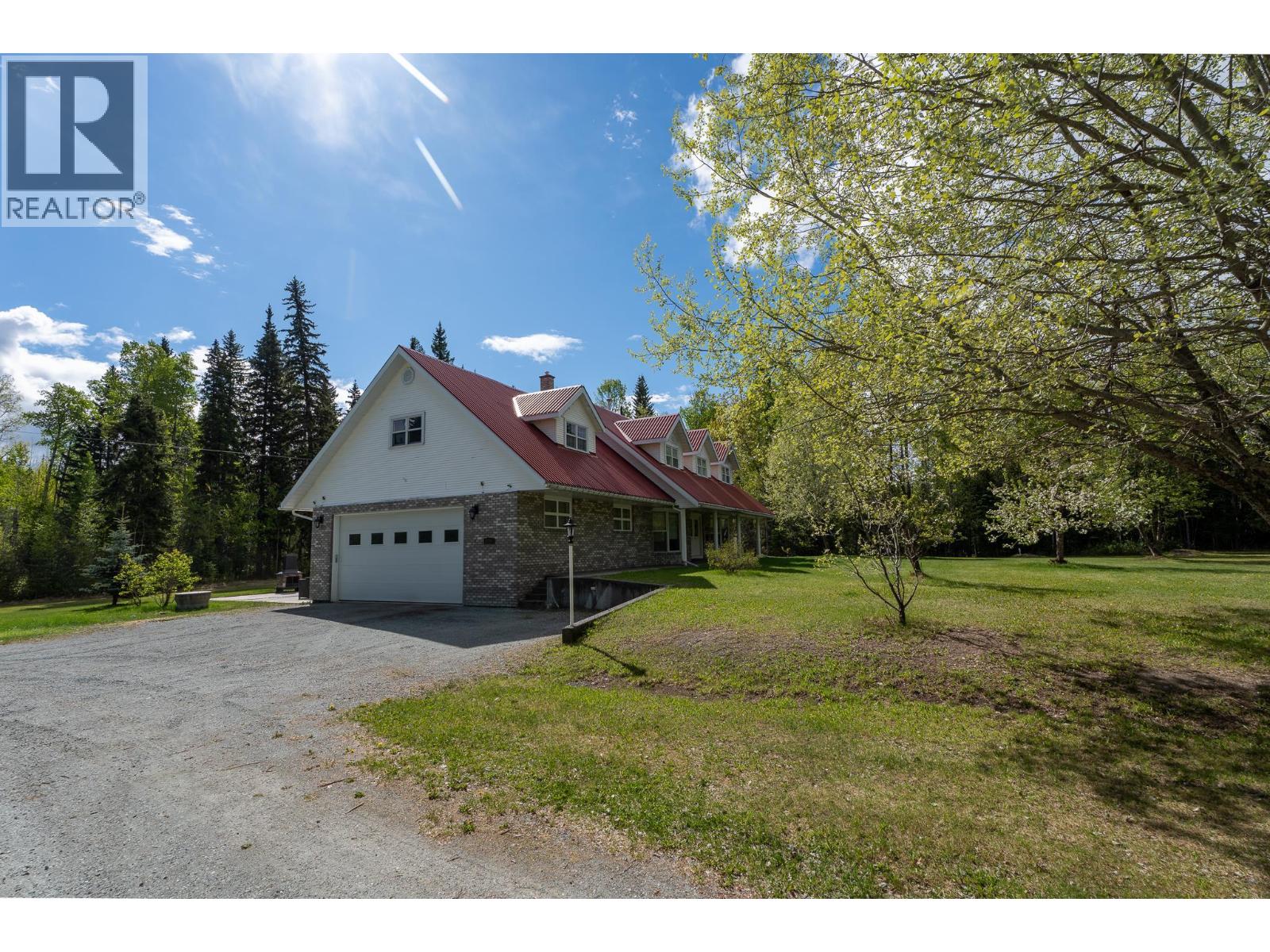 Primary bedroom of 8998 W SYKES ROAD · Prince George, BC