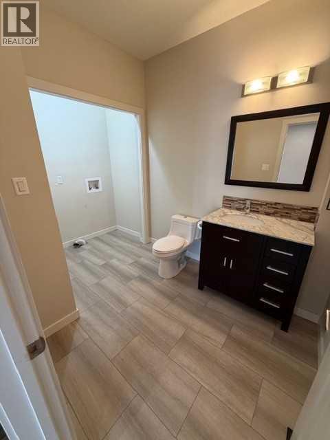Main Floor Laundry / 2 pc bath