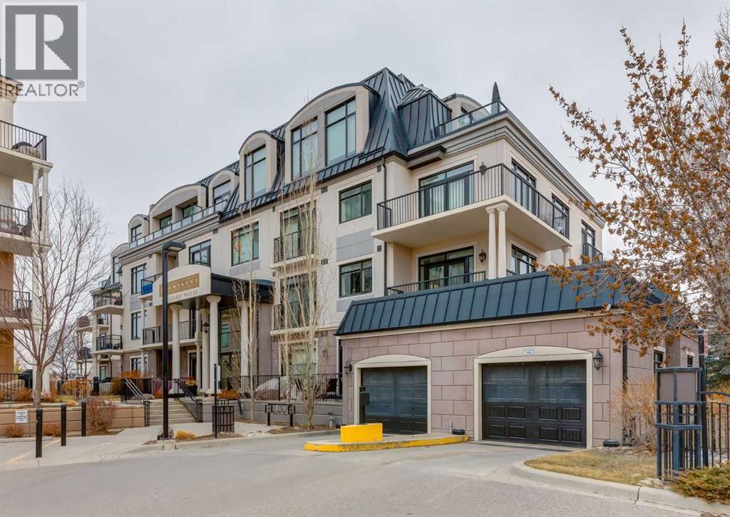 #102 121 Quarry Way SE - 2