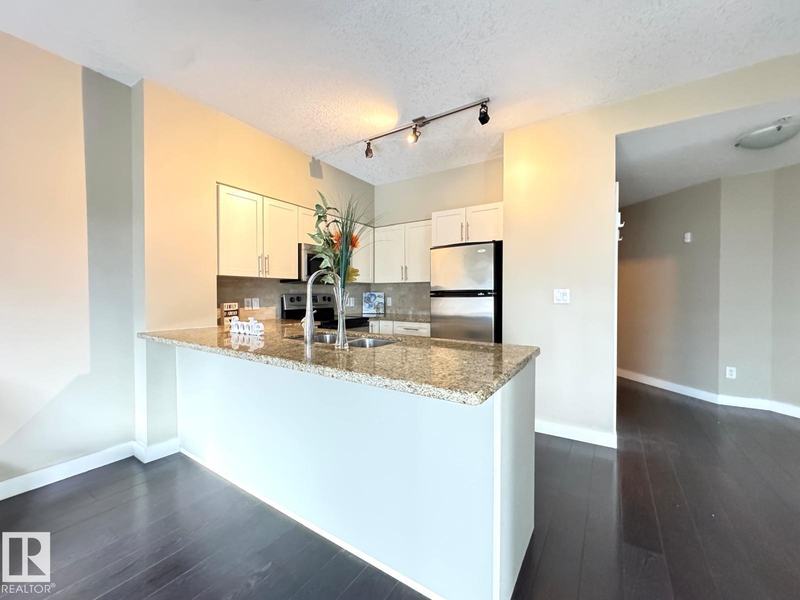 #702 10136 104 ST NW - 12