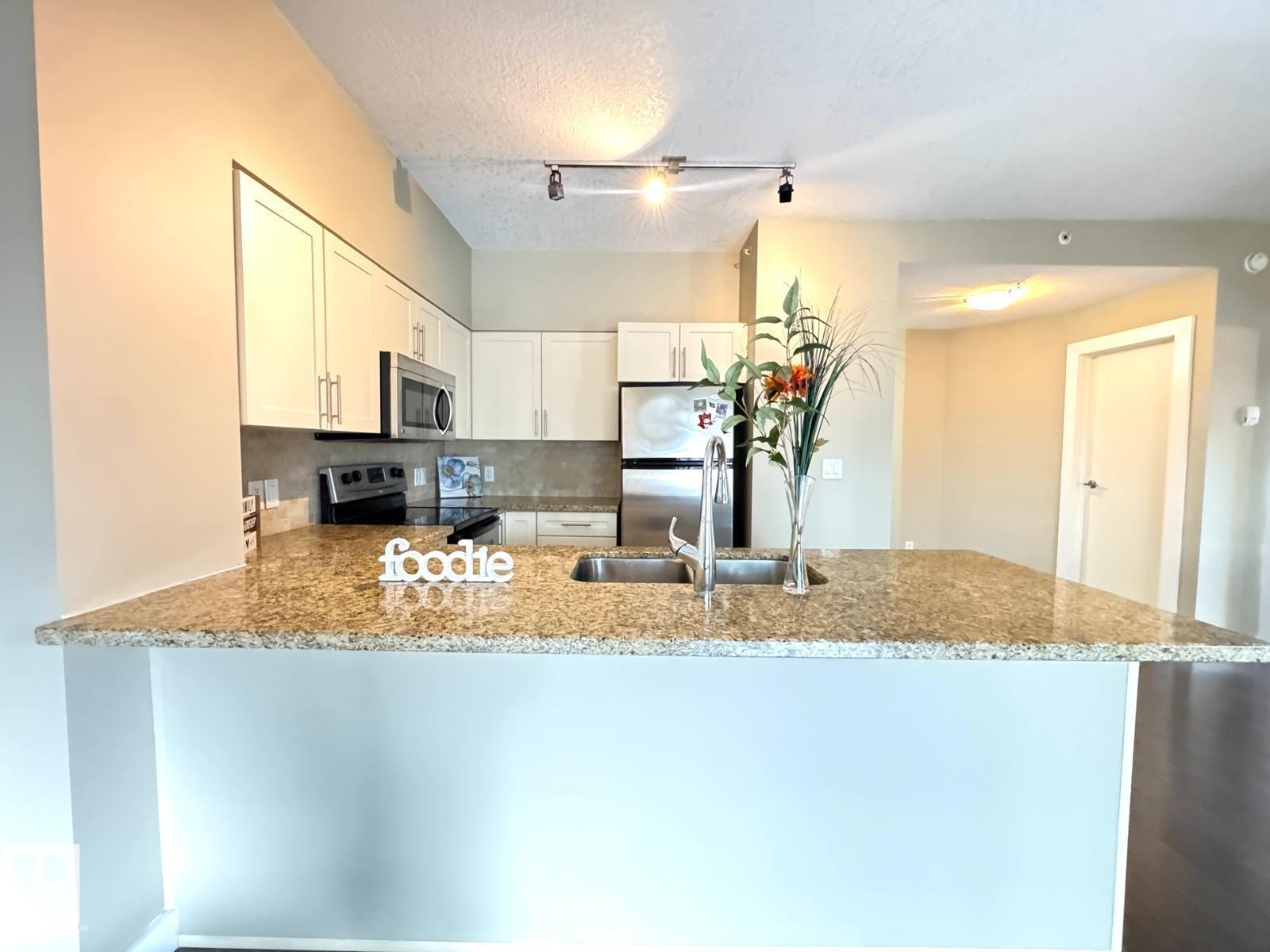 #702 10136 104 ST NW - 11