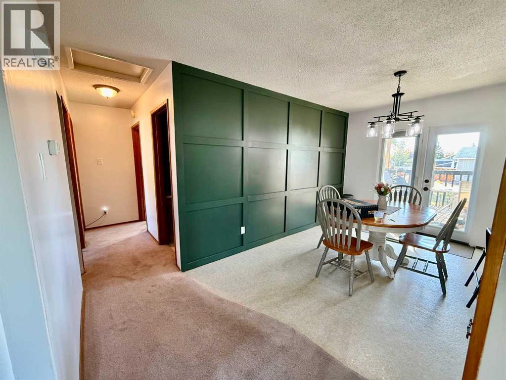 Dining Room with Hallway to Bedrooms