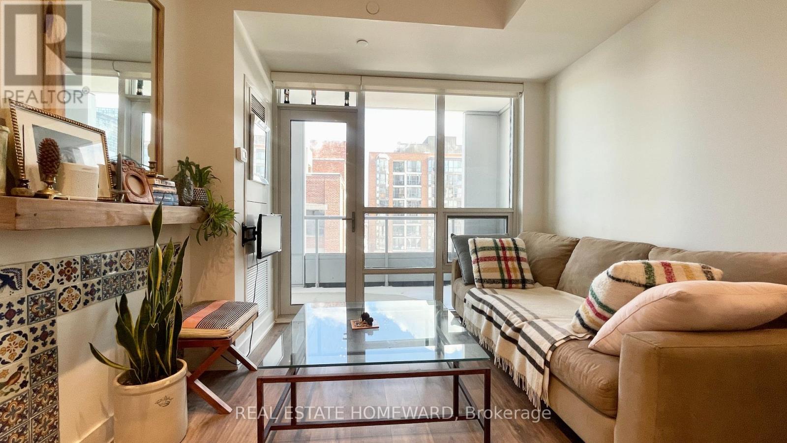 Livingroom with Walk Out to Large E Facing Balcony