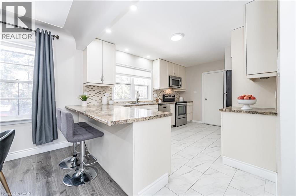 25 HAHN Place Unit# MAIN, Kitchener, Ontario, N2M1R4 — Photo 24