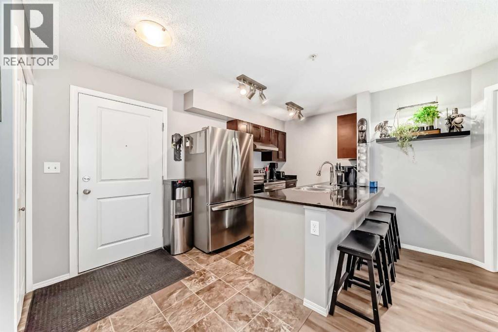 #1208 403 Mackenzie Way SW - 8