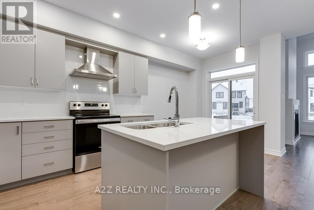 Kitchen cabinets, hood fan & island