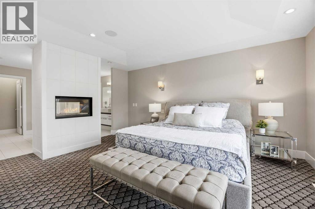Primary bedroom with double sided fireplace