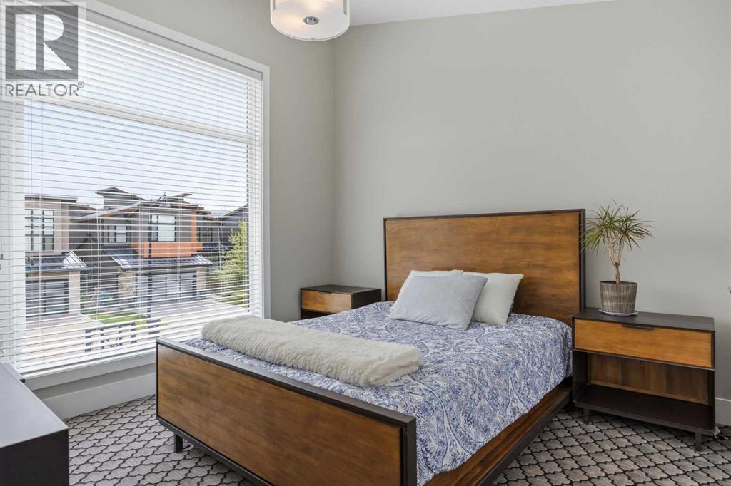 Upper bedroom with vaulted ceilings