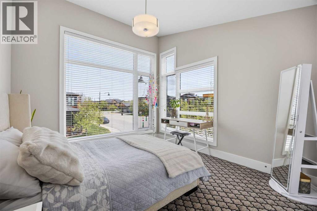 Upper bedroom with vaulted ceilings