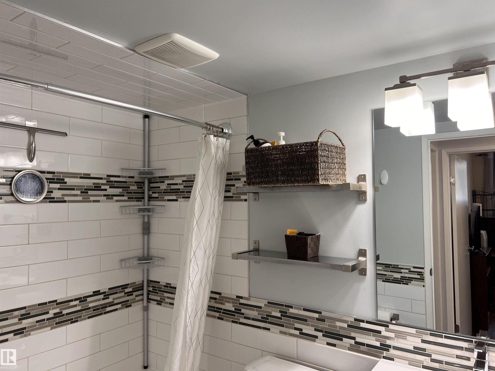 #106 10421 93 ST NW NW - 26