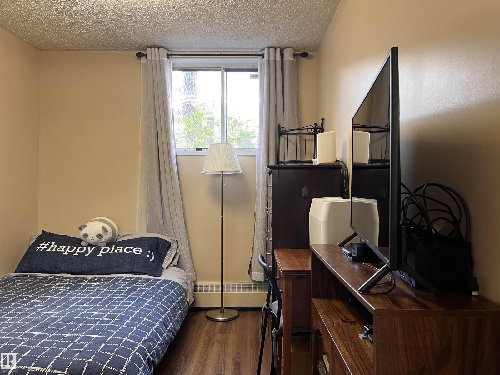 #106 10421 93 ST NW NW - 31