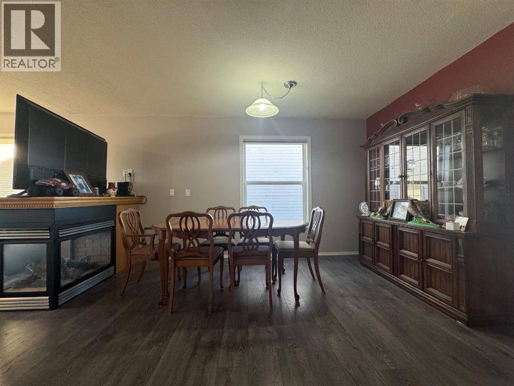 Dining Room w/ Double Sided Fireplace