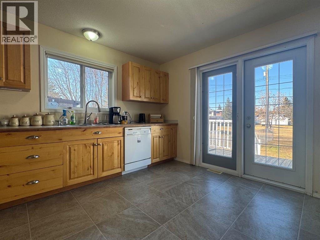 Kitchen w/ Patio Access