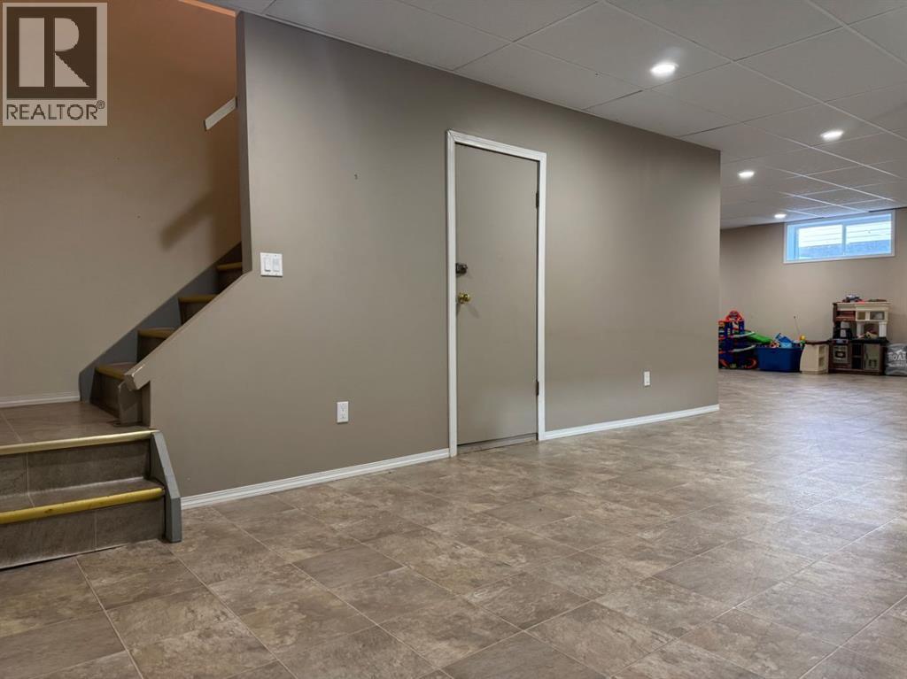Lower Level Access & Storage Room