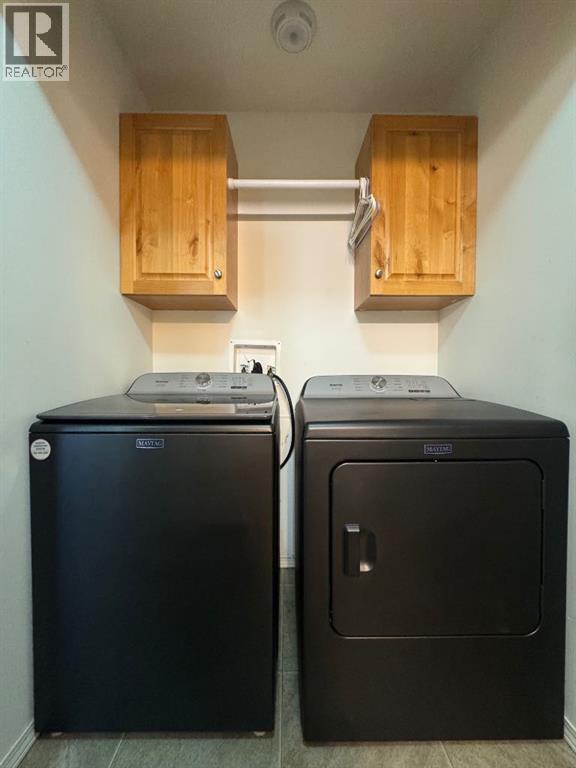 Main Floor Laundry w/ Upgraded Washer & Dryer Set