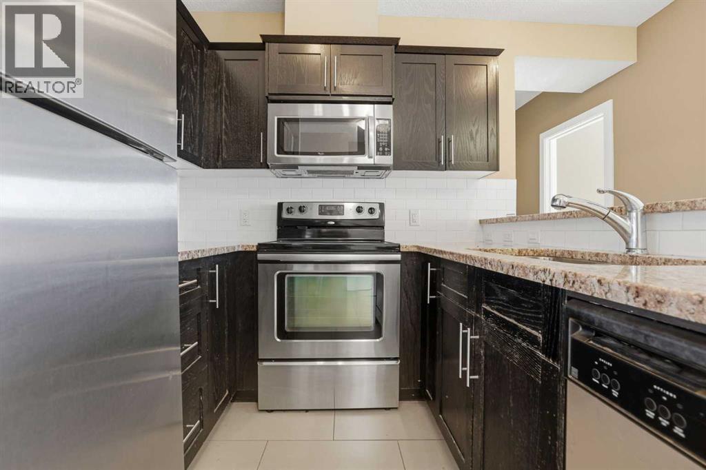 #207 117 19 Avenue NE - 14