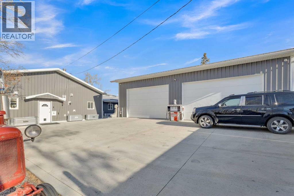 HEATED SHOP W/ 2 - 10'X16' DOORS