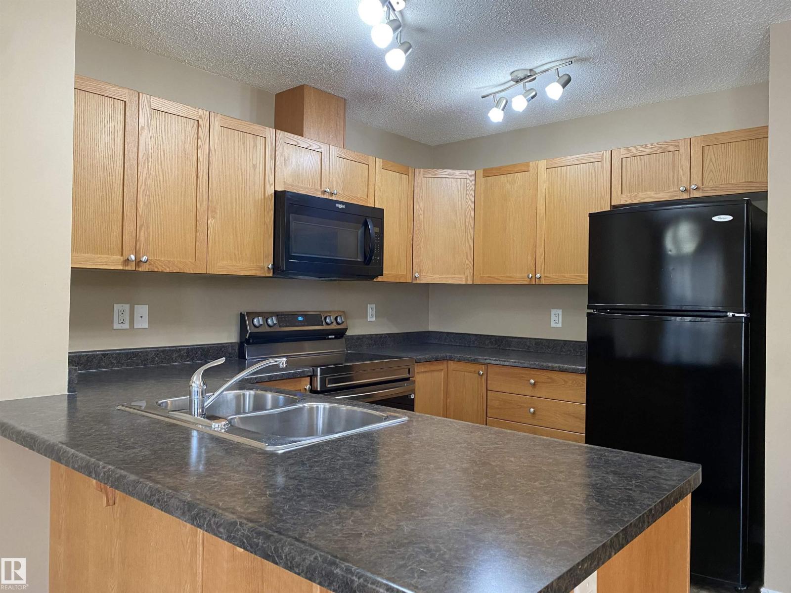 6411 18 AV SW - Image 2