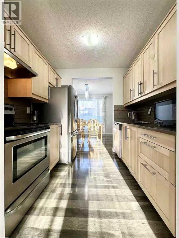 #16 6915 Ranchview Drive NW - 13