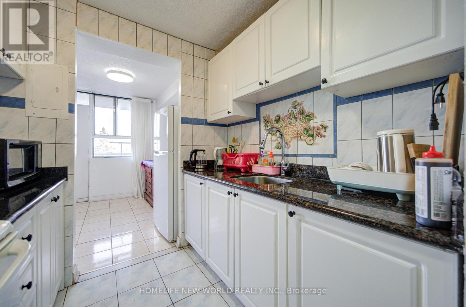#303 1950 KENNEDY ROAD - 14