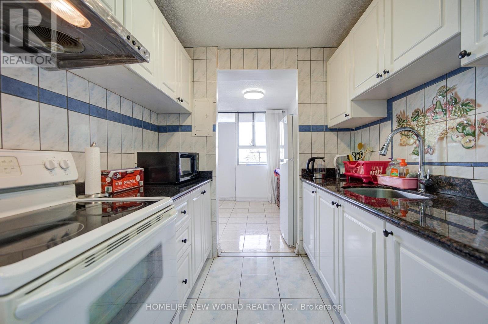 #303 1950 KENNEDY ROAD - 15
