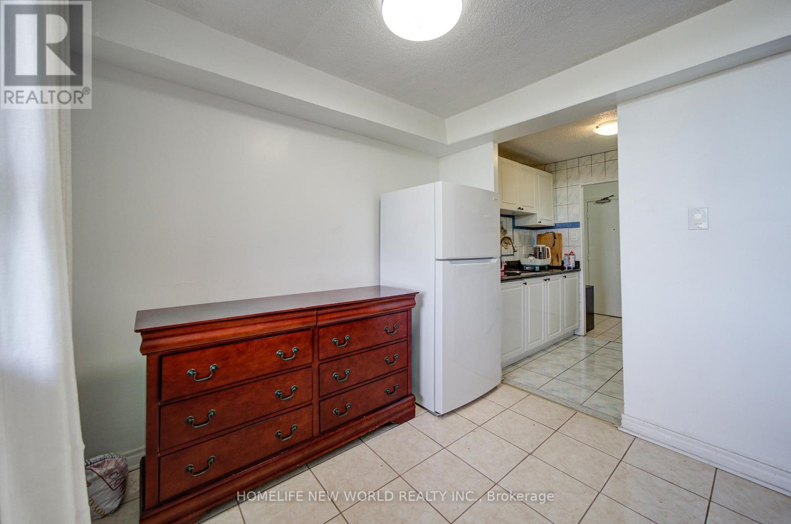 #303 1950 KENNEDY ROAD - 16
