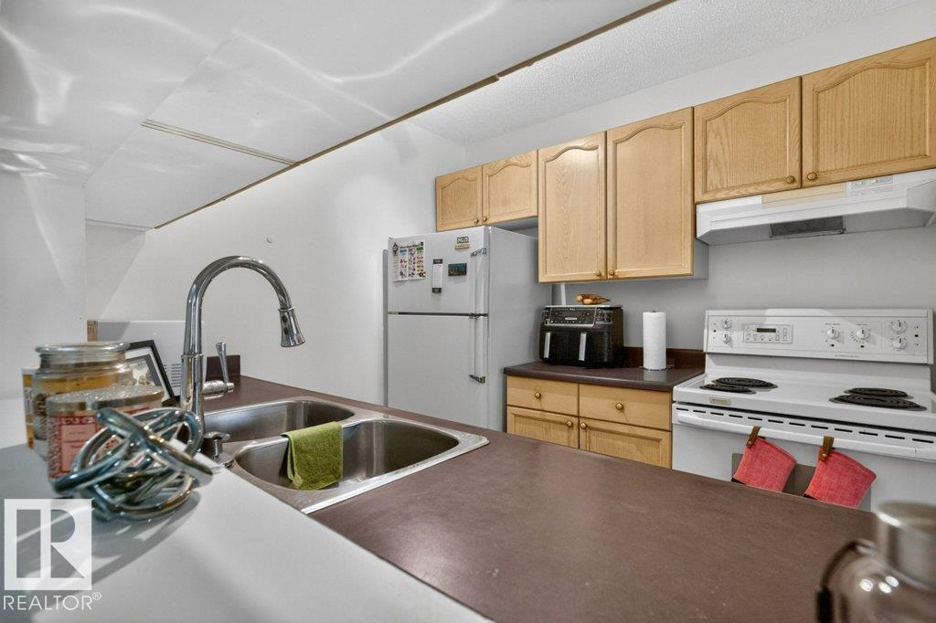 #111 11218 80 ST NW - 16