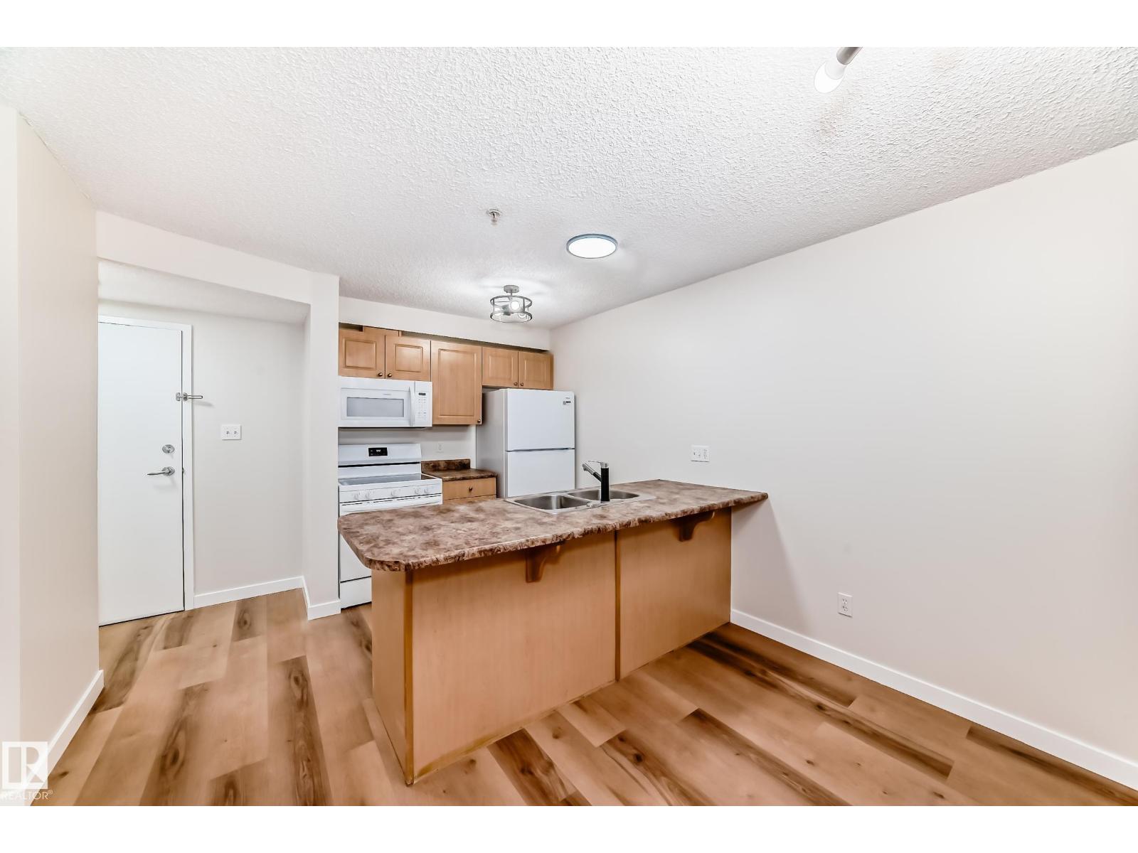 #108 12838 65 ST NW - 8