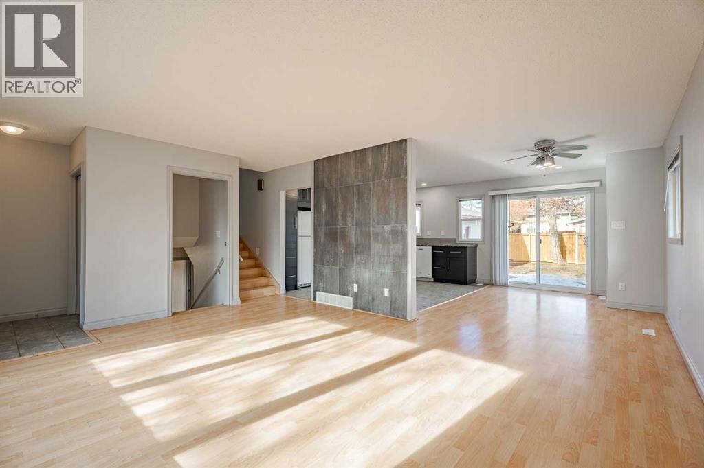 open concept - living , dining rooms and kitchen