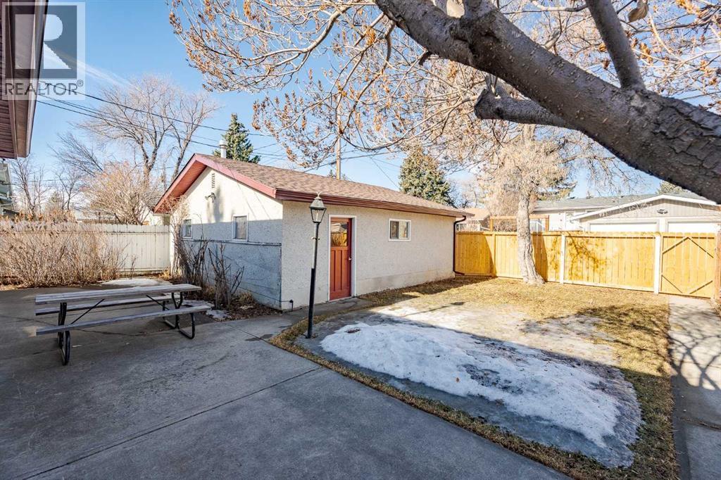 huge patio off the dining room in private backyard