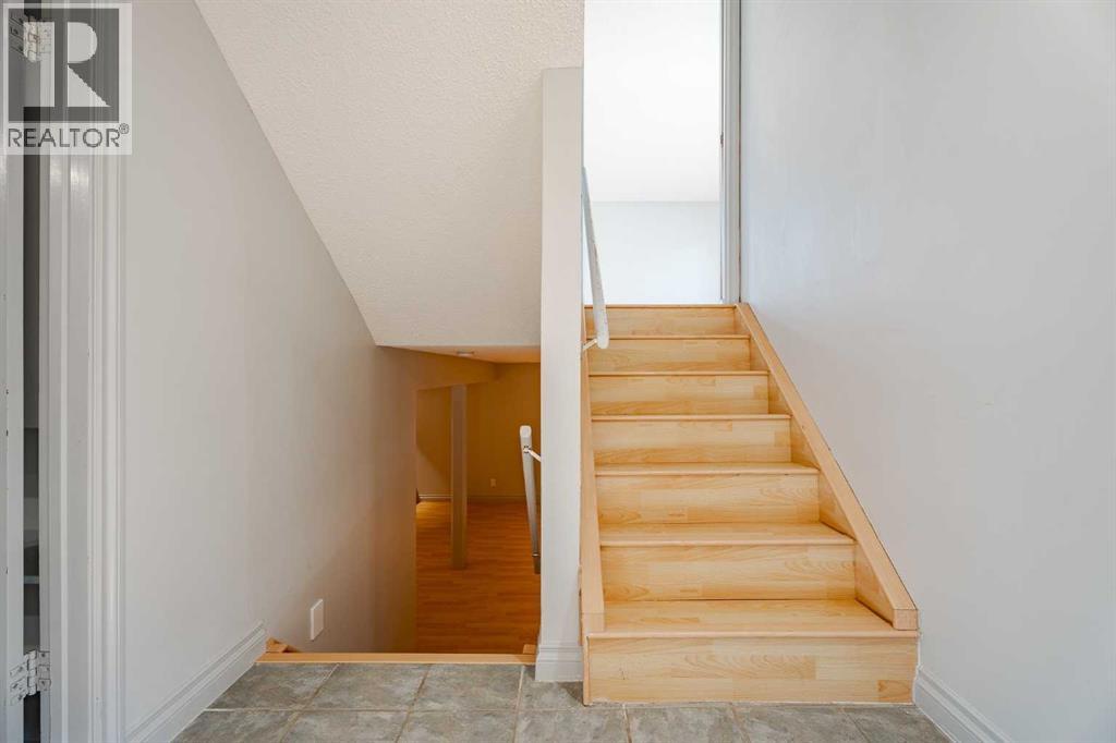 stairway going to third level  from main floor