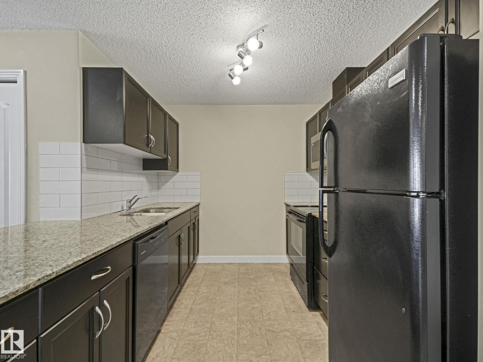 #317 12650 142 AV NW - 5