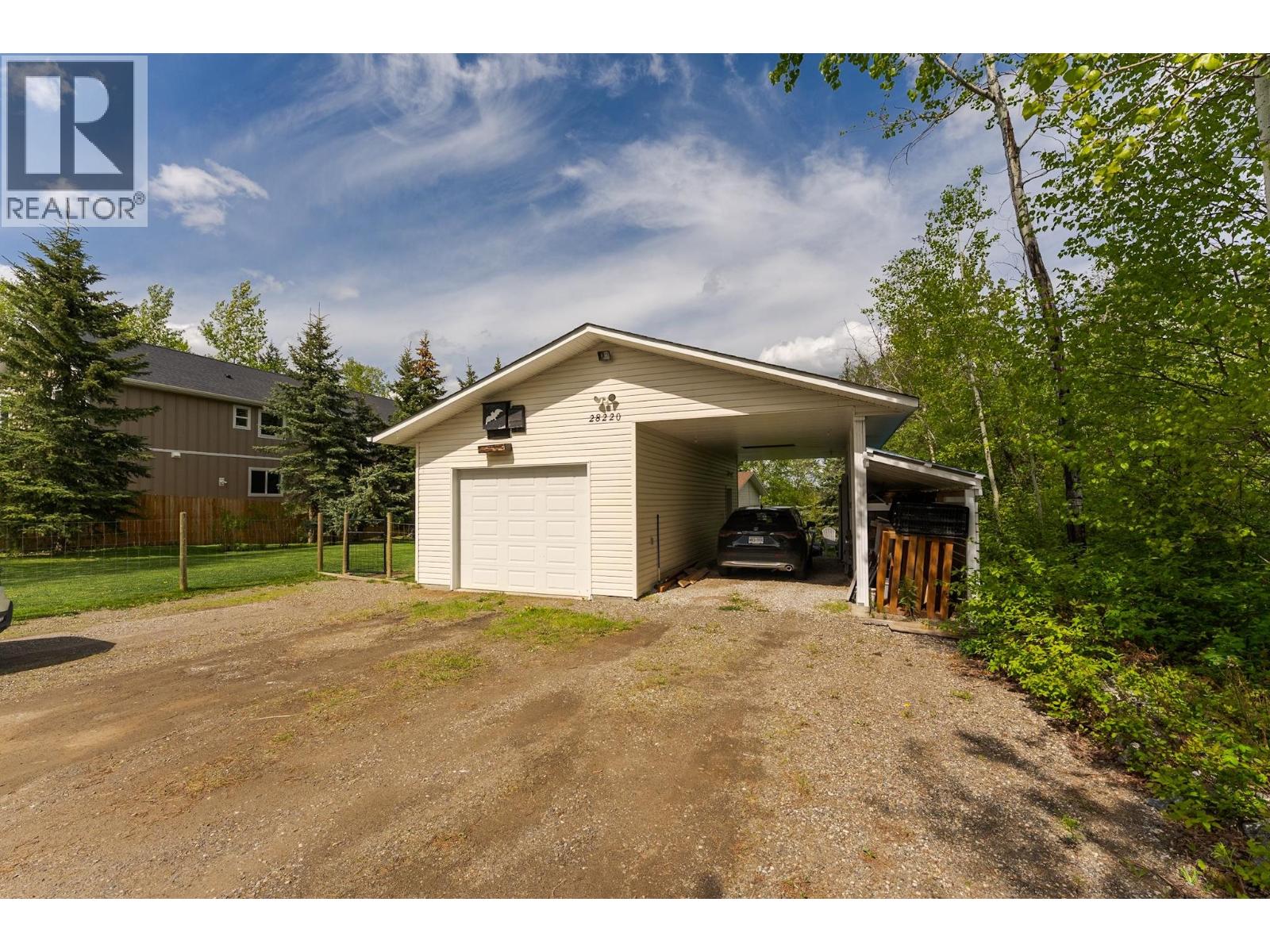Primary bedroom of 28220 NESS LAKE ROAD · Prince George, BC