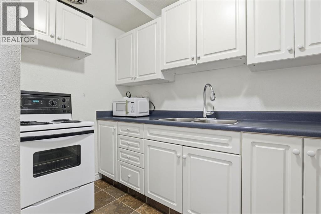 #100 4740 Dalton Drive NW - 11